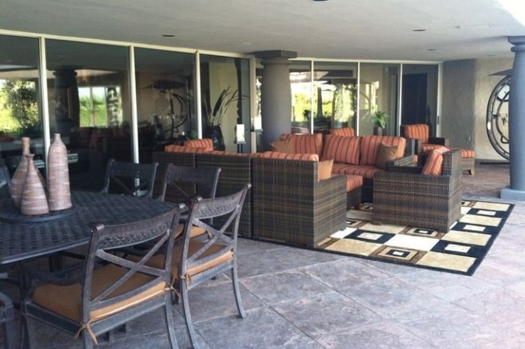 The Rancho Mirage home features expansive indoor and outdoor living areas.