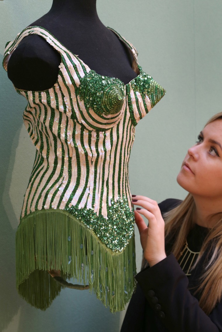 Pricey piece of history: A Christie's employee looks at a couture corset designed by Jean Paul Gaultier for Madonna on Nov. 23 in London, England. It sold for £32,450 at auction.