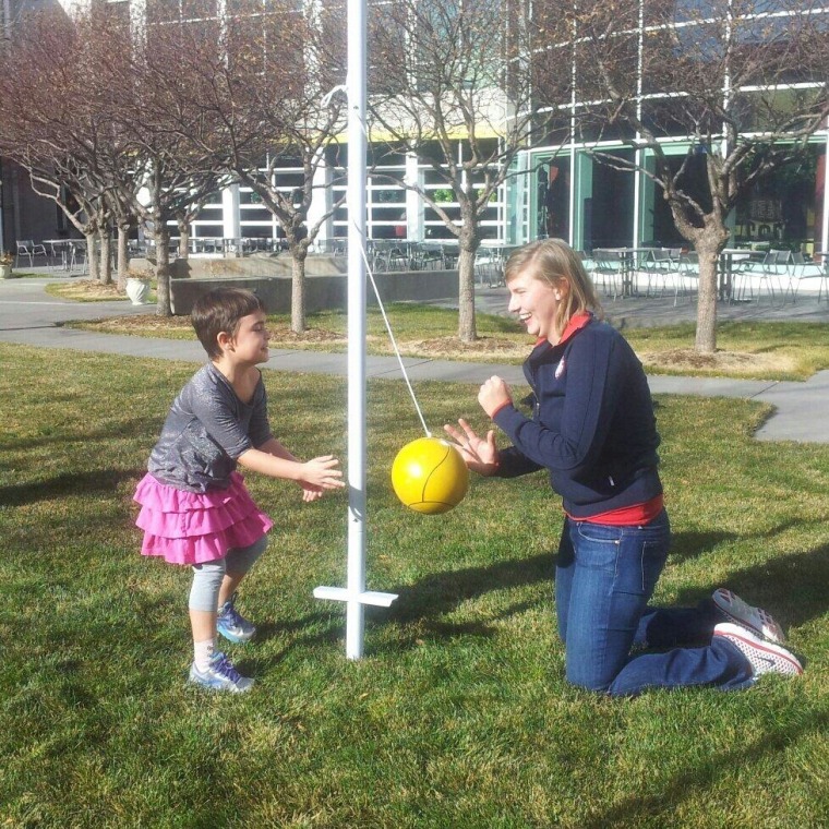 Before playing tetherball, Ruby led the athletes in a warm-up of 20 jumping jacks.