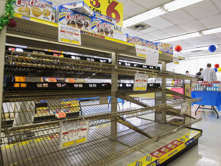 So long, Twinkies and Ding Dongs: Shelves lay empty at a Wonder Bread Hostess Bakery Outlet in Glendale, California, November 16, 2012.