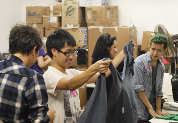 How do you get teens to volunteer, well, voluntarily? The Do Good Bus appeals to Foster the People fans. Here, volunteers with the Do Good Bus sort and fold clothing donations.