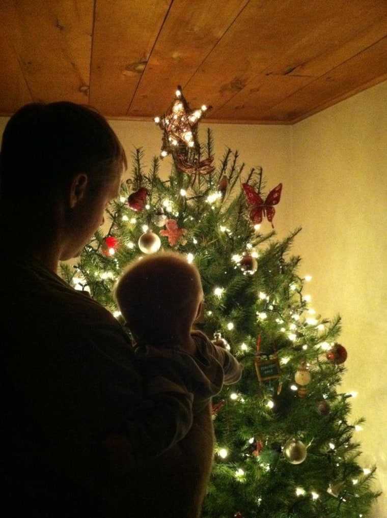 Gus, 6 months, decorating with Daddy