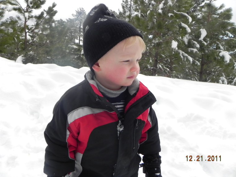 Peyton, 2, enjoys some rare desert snow.