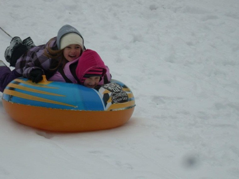 Brenna and Hailee, 6, do a little winter tubing