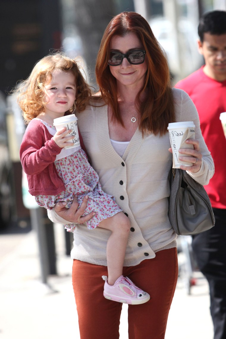 Alyson Hanningan and daughter Satyana got their mom and mini-me Starbucks fix before heading to a play date in Los Angeles.