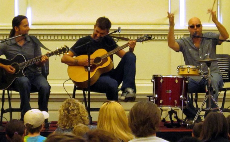Verve Pipe guitarist Lou Musa (left), Brian Vander Ark and drummer Donny Brown perform at the Grand Rapids Public Library.