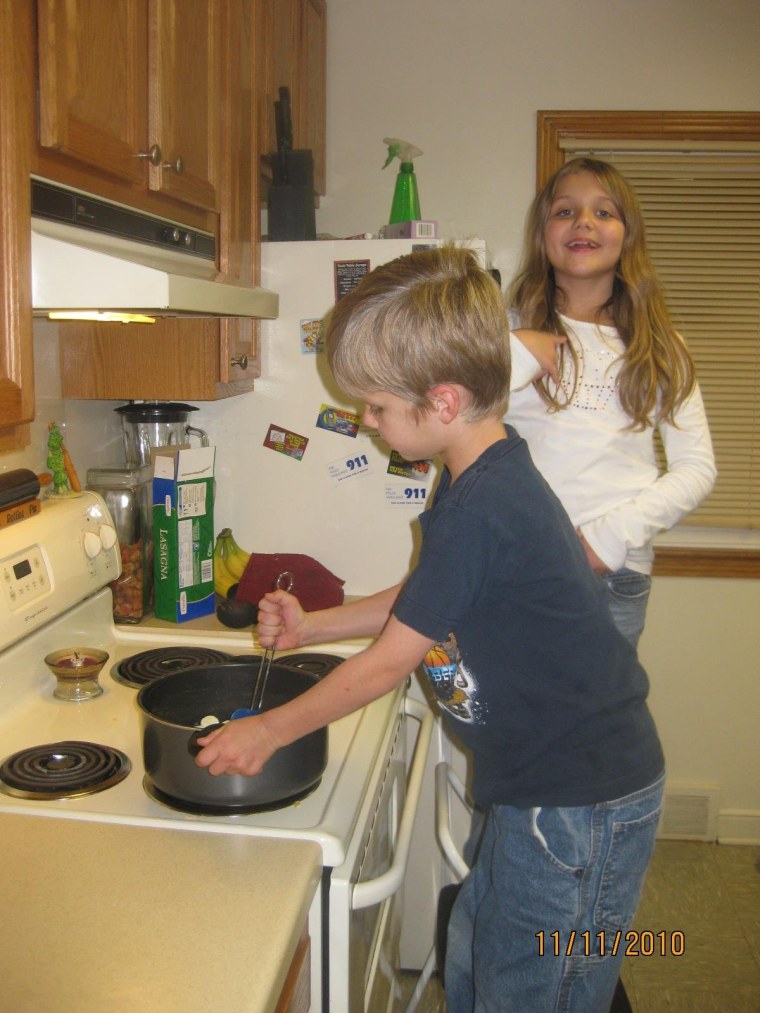 Brandon, 6, and Dakota, 8.5, made Rice Krispies with M&Ms... yum!