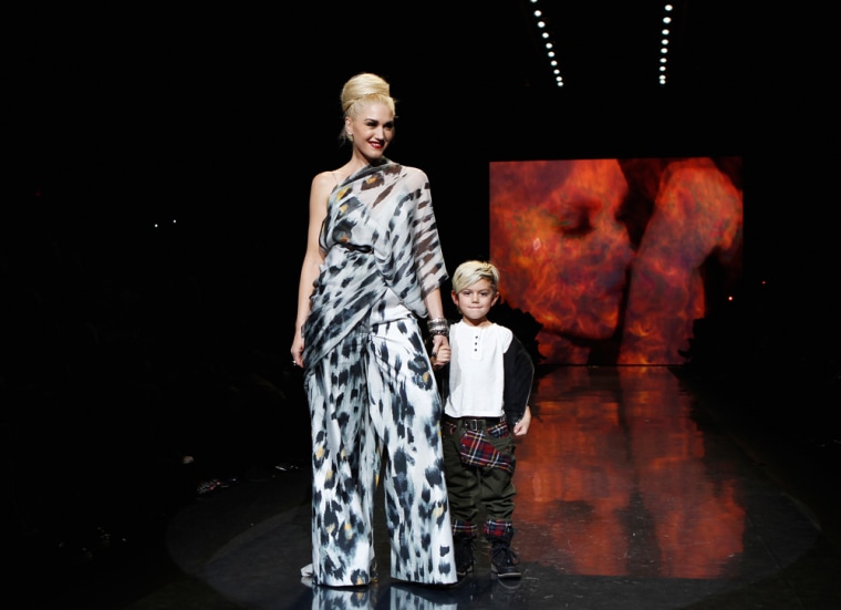 Designer Gwen Stefani and her son, Kingston, walk the runway at her L.A.M.B. Fall/Winter 2011 collection in New York.