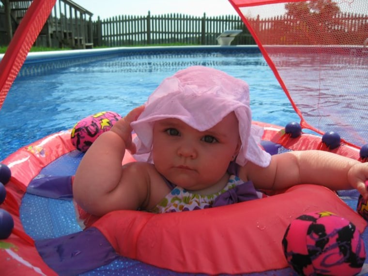 Olivia staying cool in the pool.