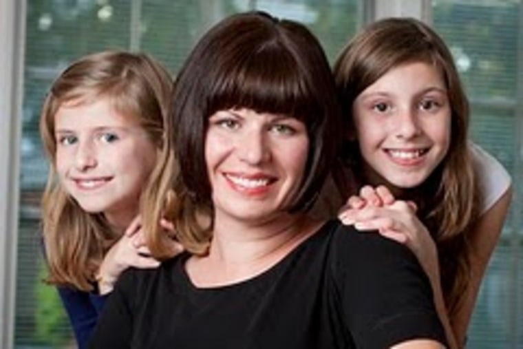 Writer Jenny Kales with her 8-year-old daughter, Zoe (left), and 11-year-old daughter, Alexandra.