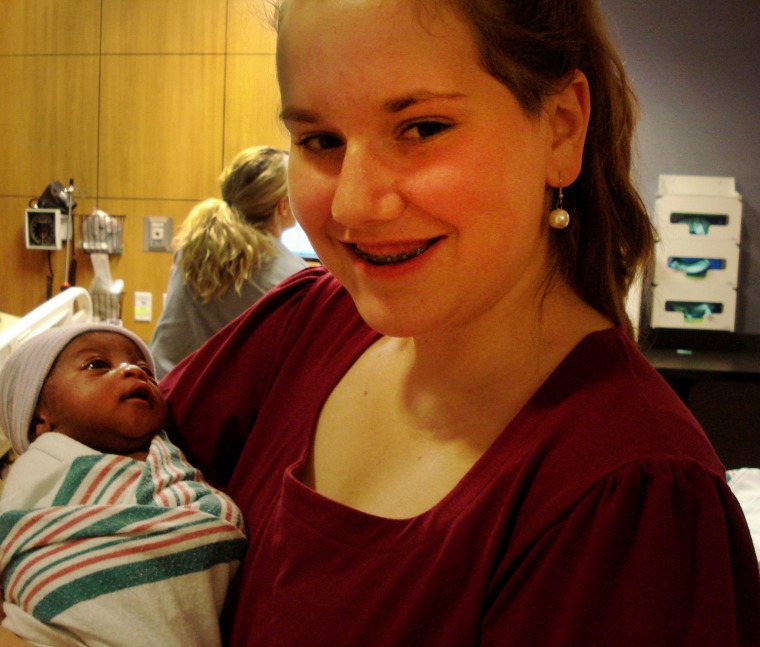 Allie Sakowicz, with one of the babies she helped deliver as a teen doula.