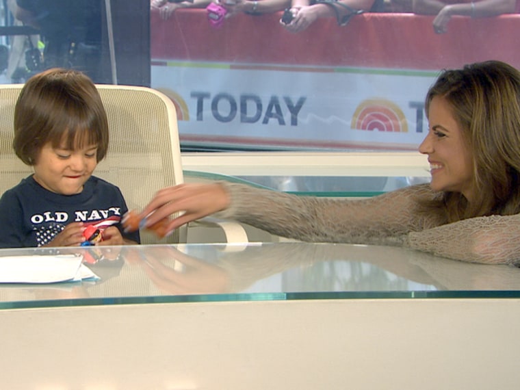 Meanwhile, over at the anchor desk, Natalie Morales (who has a son around the same age) entertains a stray octuplet.
