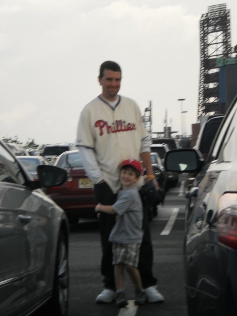Bill Shreiner taking son Michael to his first baseball game.