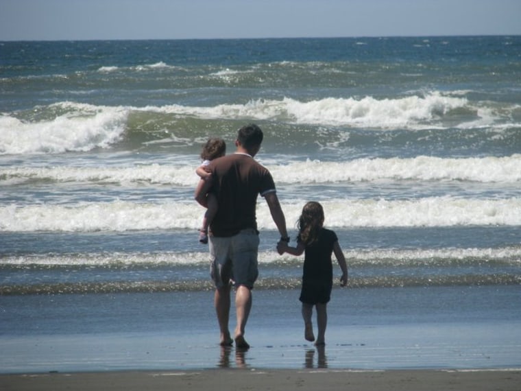 Ray Pruitt with daughters Leila and Josie  at the beach in Ocean Shores, Wash.
