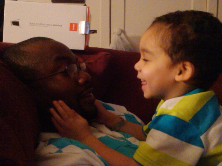 Kennedy telling his daddy, Etse, a story