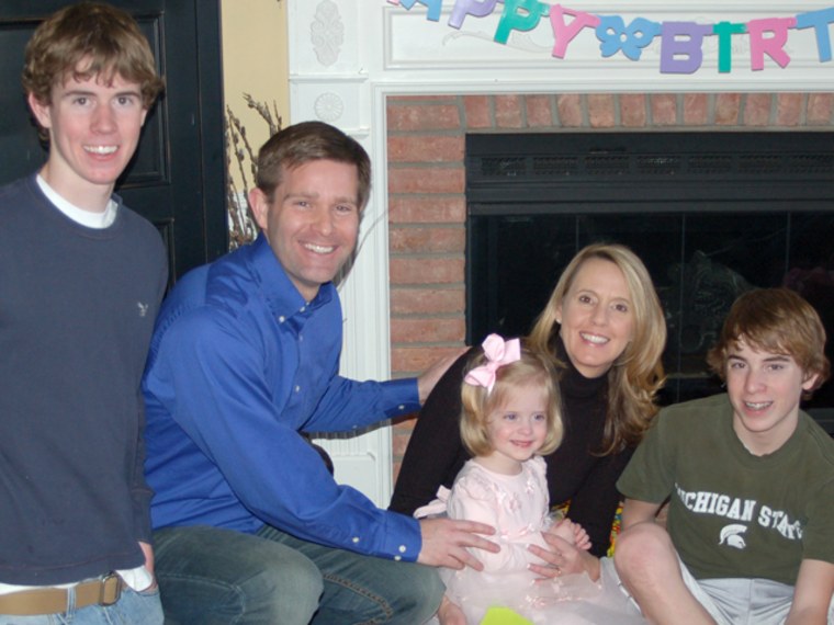 Carolyn and Sean Savage and their three kids.