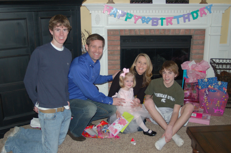 Carolyn Savage, husband Sean and their three children