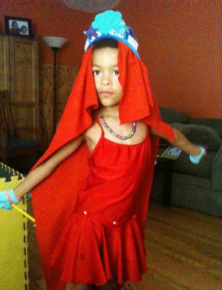 scared boy hiding in his mom's dress - a Royalty Free Stock Photo from  Photocase