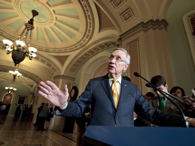 Senate Majority Leader Harry Reid of Nev. gestures as he speaks to reporters on Capitol Hill in Washington, Tuesday, Dec. 4, 2012, following a Democratic strategy session. (AP Photo/J. Scott Applewhite)