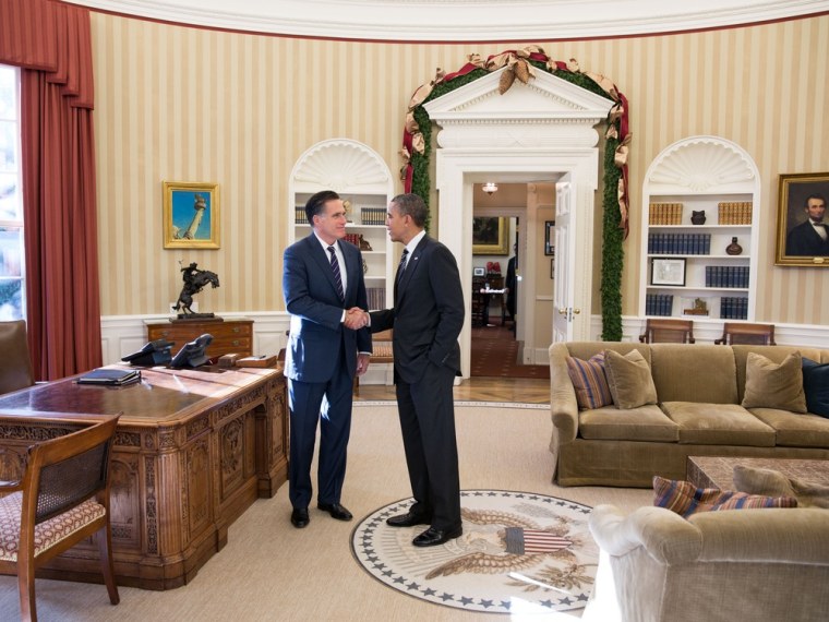 WASHINGTON - NOVEMBER 29: In this handout from the White House, Former Republican presidential candiate and Massachusetts Gov. Mitt Romney (L) shakes hands with U.S. President Barack Obama in the Oval Office following their lunch November 29, 2012 in Washington, DC . Obama had invited Romney to the White House for the lunch.