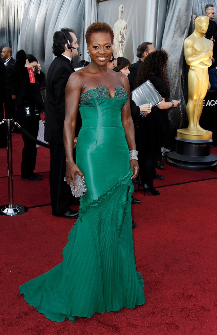 Viola Davis, wearing a strapless emerald green Vera Wang gown, arrives at the 84th Academy Awards on  Feb. 26. Her bold gown as been named as one of the influences for Pantone's Color of the Year.