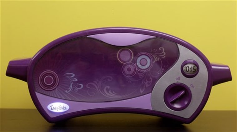 Hasbro's Easy-Bake Oven comes in two colors: purple and pink.