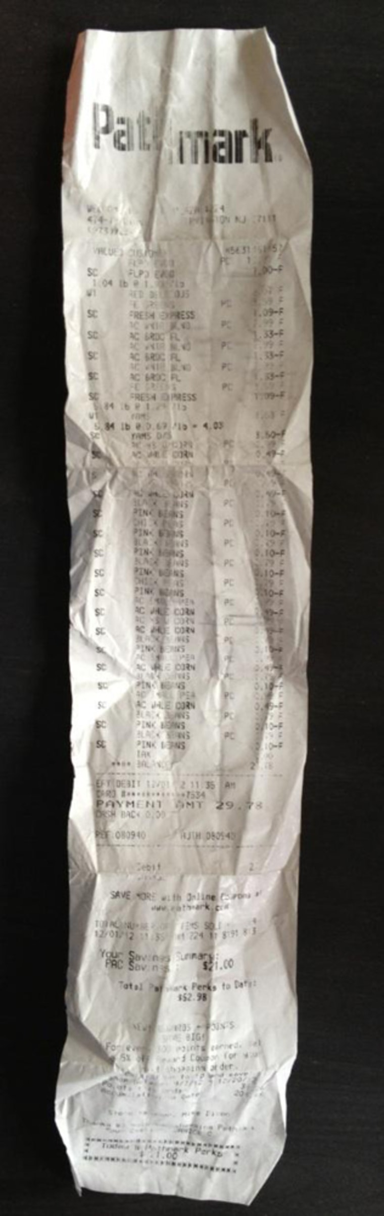 Booker spent $29.78 at the grocery store at the start of his challenge.