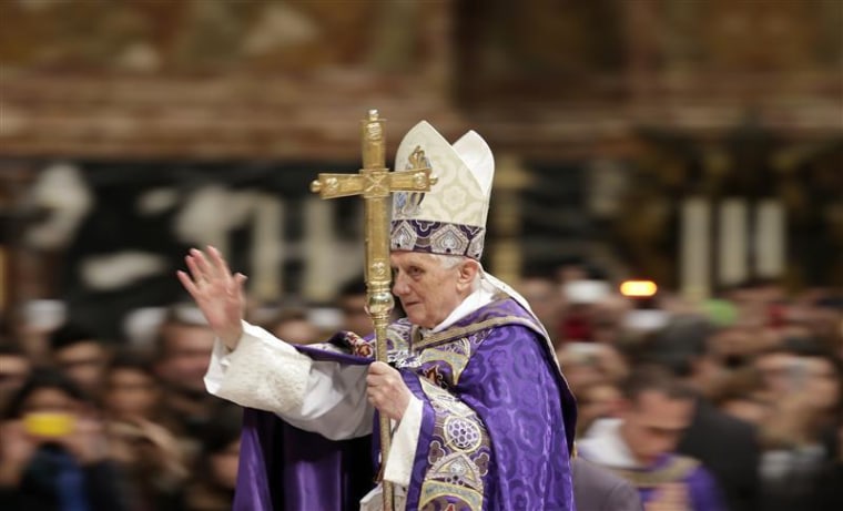Pope Benedict XVI arrives to lead a Vespers mass in Saint Peter's Basilica at the Vatican.