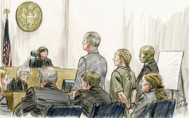 Colleen LaRose, known by the self-proclaimed alias 'Jihad Jane,'stands before Magistrate Judge Lynne A. Sitarski, left,, flanked by public defenders Mark Wilson and Ross Thompson, standing at right, is shown being arraigned on federal terrorism charges in Philadelphia, in a March 18, 2010 courtroom sketch.