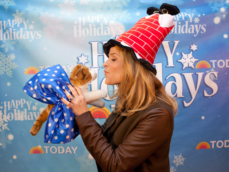 TODAY correspondent Jenna Bush Hager plants a holiday smooch.