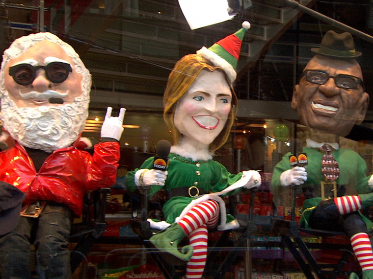 A modern-day Santa sits side by side with cartoon versions of Savannah and Al.