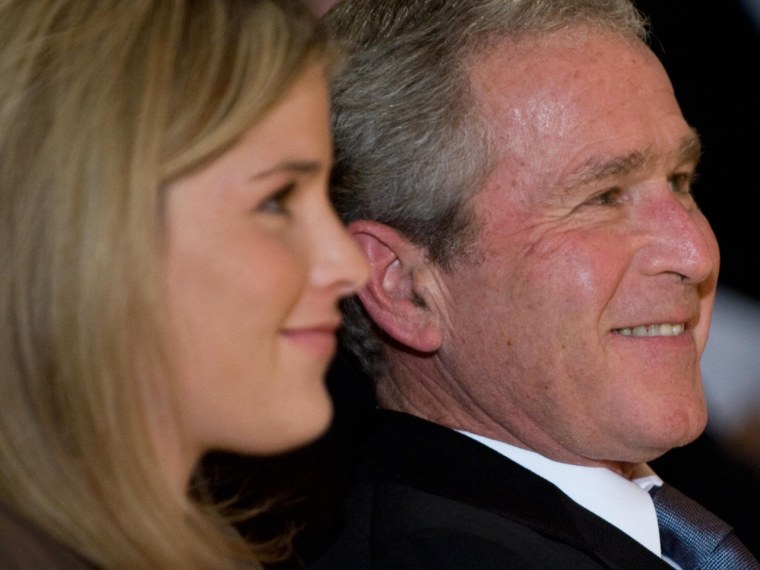 US President George W. Bush and his daughter, Jenna Bush Hager, listen as First Lady Laura Bush addresses the 2008 National Book Festival Gala Perform...