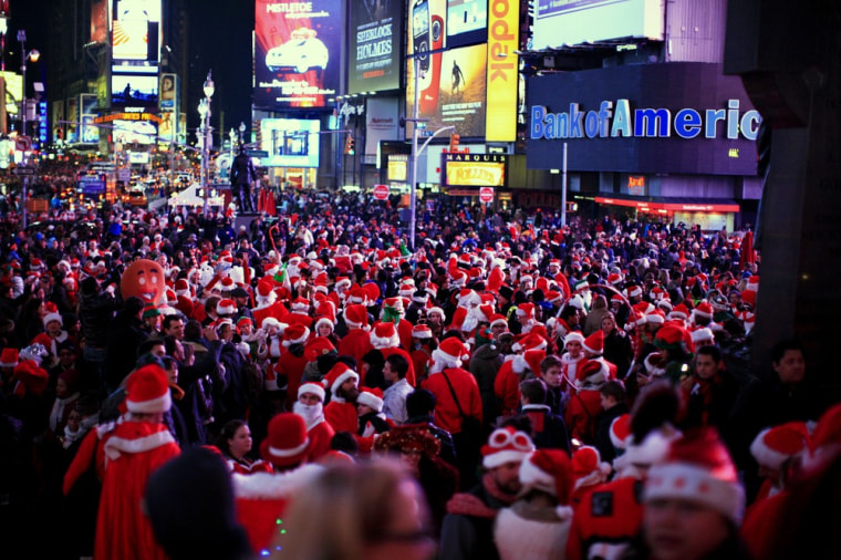 Thousand of people dressed in Santa Claus costume gather at Times Square during the annual SantaCon celebration in New York on Dec. 10, 2011.