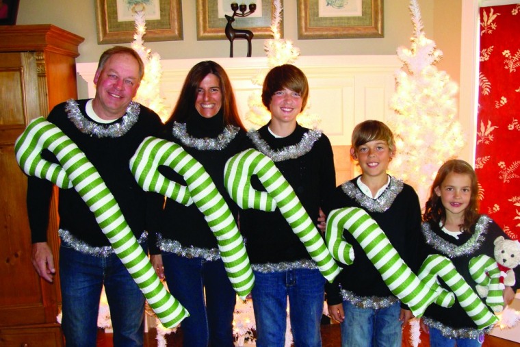 Candy cane, anyone? Nothing like matching sweaters for the annual holiday family photo.