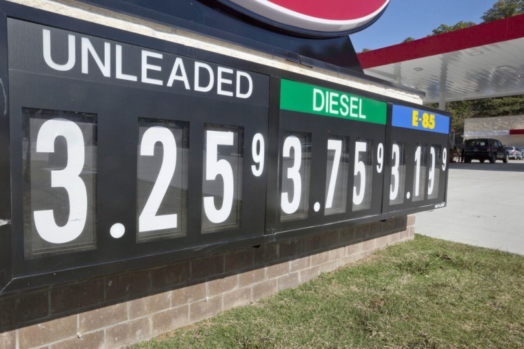 In this Tuesday, Oct. 30, 2012, photo, lower fuel prices are advertised at North Little Rock, Ark., gas station. Lower gas prices were behind the larg...