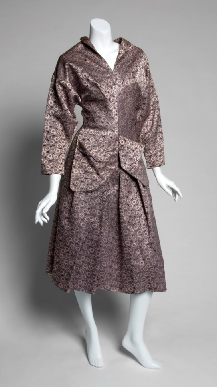 A black and pink two piece ensemble that belonged to actress Greta Garbo is shown in this publicity photo.