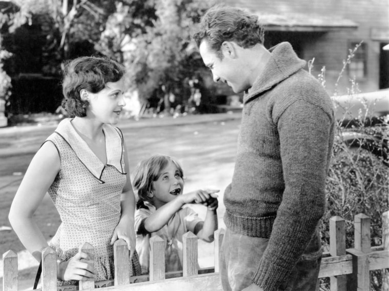 Jack Hanlon, at about age 12, in 1929's \"The Shakedown\" with Barbara Kent and James Murray.