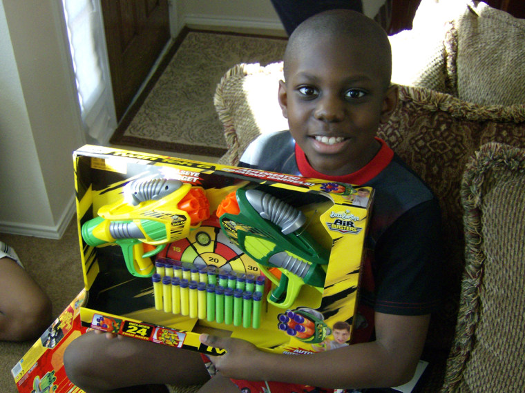 Jordan Shaffer is pictured opening Christmas presents in 2009. Jordan, who is now 11 years old, delighted his family with his reaction to the gift of a telescope last Christmas.