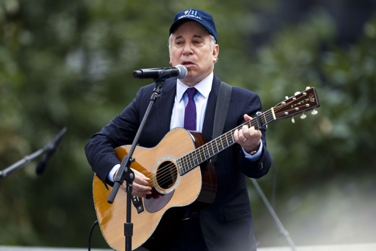 Paul Simon is seen performing \"Sound of Silence\" during the 10th anniversary commemoration of the attacks on America at Ground Zero in New York on Sept. 11, 2011. He performed the same song at Victoria Soto's funeral.