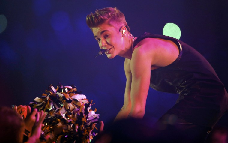 Justin Bieber performs during the half-time show at the 100th CFL Grey Cup championship football game in Toronto, Canada, Nov. 25, 2012.