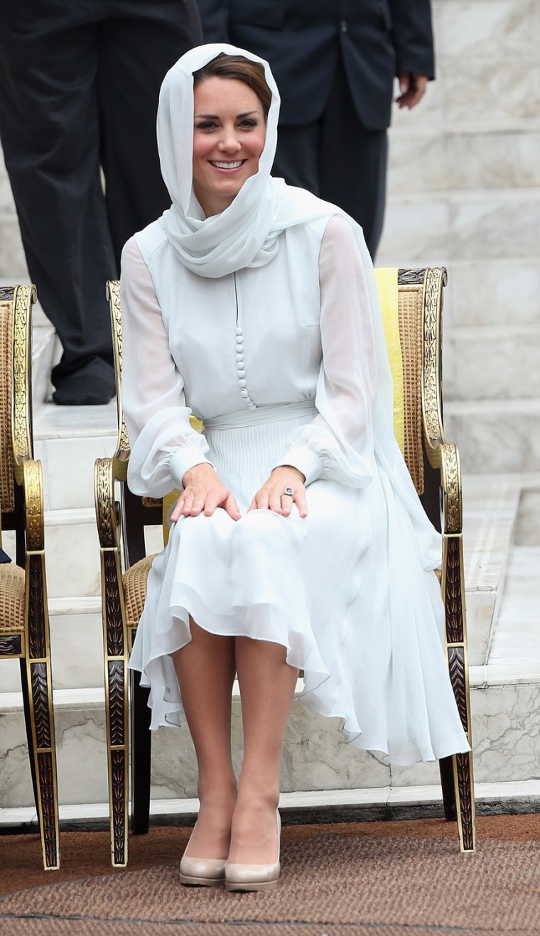 Kate channels the late Princess Diana in a headscarf and Beulah London dress on her visit to the Assyakirin Mosque on Sept. 14 in Kuala Lumpur, Malaysia.