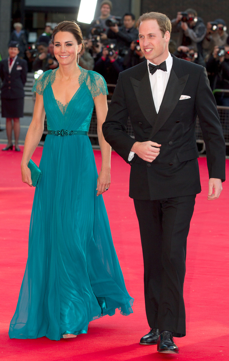Prince William and Duchess Kate, wearing a teal Jenny Packham gown, attend the