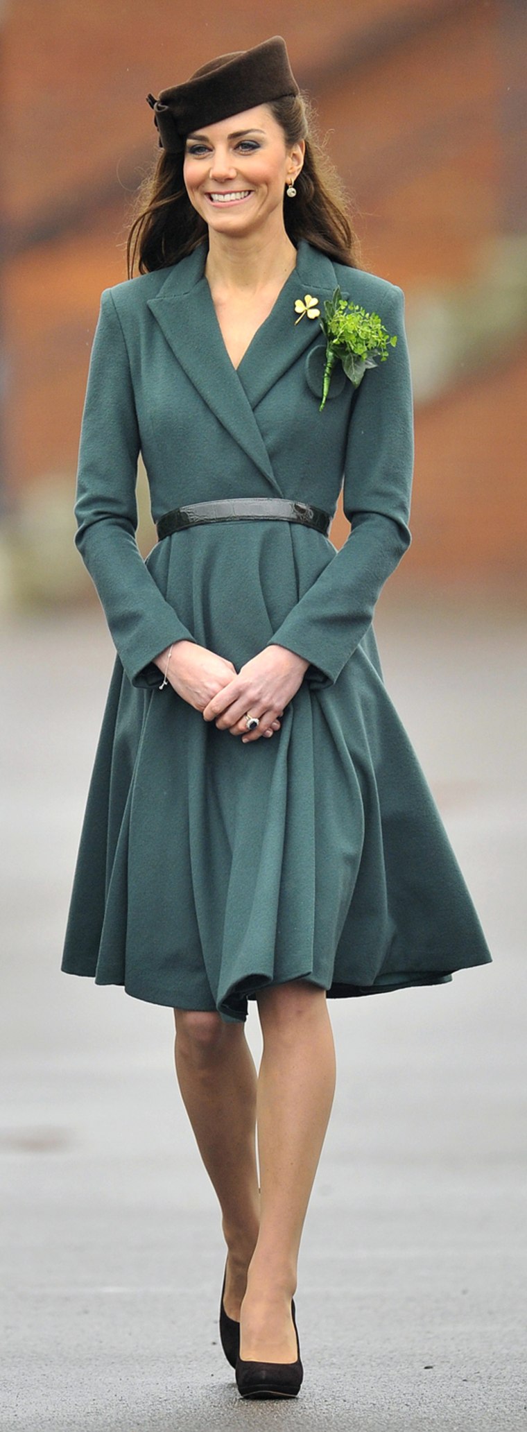 Dressed in theme, Kate presented shamrock flowers at a parade ground at an army base in southern England on March 17, St. Patrick's Day.