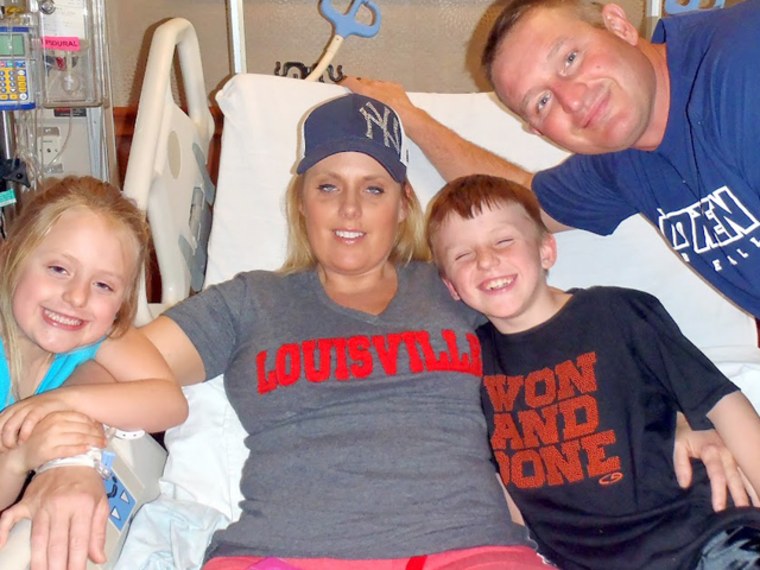 Stephanie Decker saved her two kids by laying on top of them during a tornado.