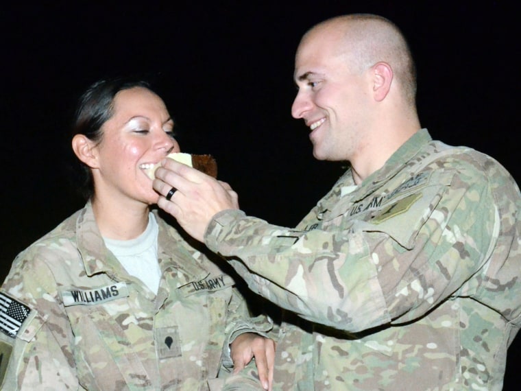 Fidler and were surprised by friends with a rooftop celebration of cake and non-alcoholic beer at Bagram Airfield in Afghanistan, one day after they were married via a double-proxy wedding in Montana.