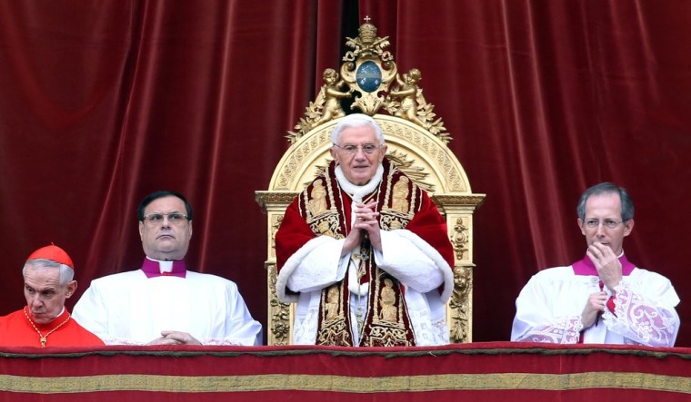 Pope Benedict XVI delivers his Christmas Day message from the balcony of St. Peter's Basilica on Christmas day in Vatican City.