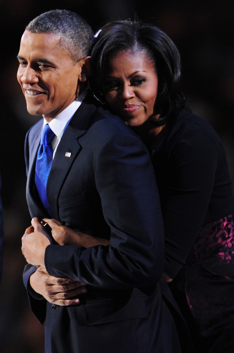 Barack and Michelle Obama celebrate on stage after the President won re-election on November 7.