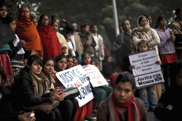 Indian protesters listen to a speaker during a protest against a recent gang rape of a young woman in a moving bus in New Delhi on Dec. 27.