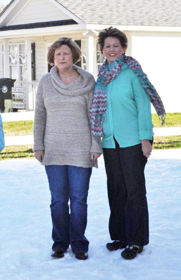 North Carolina woman Laurie Pearson (at left), who is battling Stage IV cancer, received a surprise white Christmas from her husband, who had a company create man-made snow to fulfill her Christmas wish. She is pictured with sister-in-law Janice Jones on her snow-filled front yard on Dec. 22.