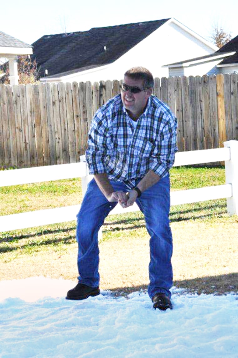 Kevin Pearson, who fulfilled his ailing wife's wish of a white Christmas, had some fun making snowballs with family and kids from the neighborhood.